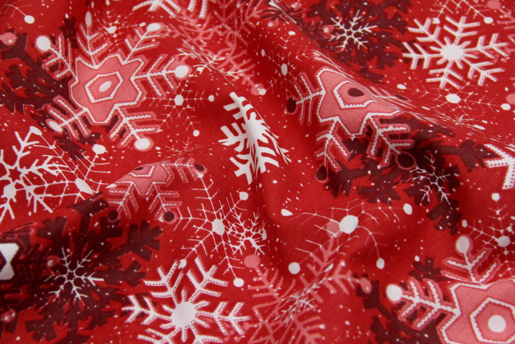 Ткань скатертная с тефлоновой пропиткой Танец снежинок Красный