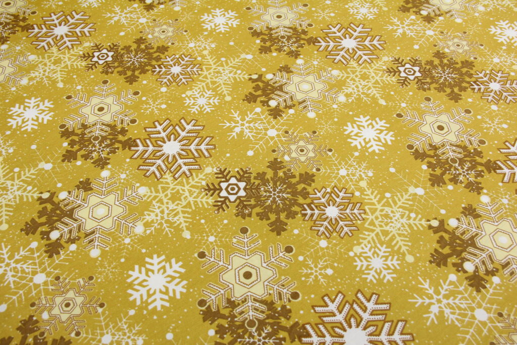 Ткань скатертная с тефлоновой пропиткой Танец снежинок Охра