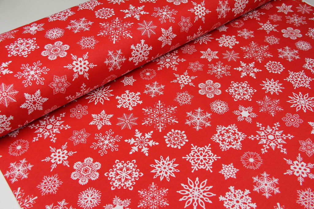 Ткань скатертная с тефлоновой пропиткой Снежинки белые на красном