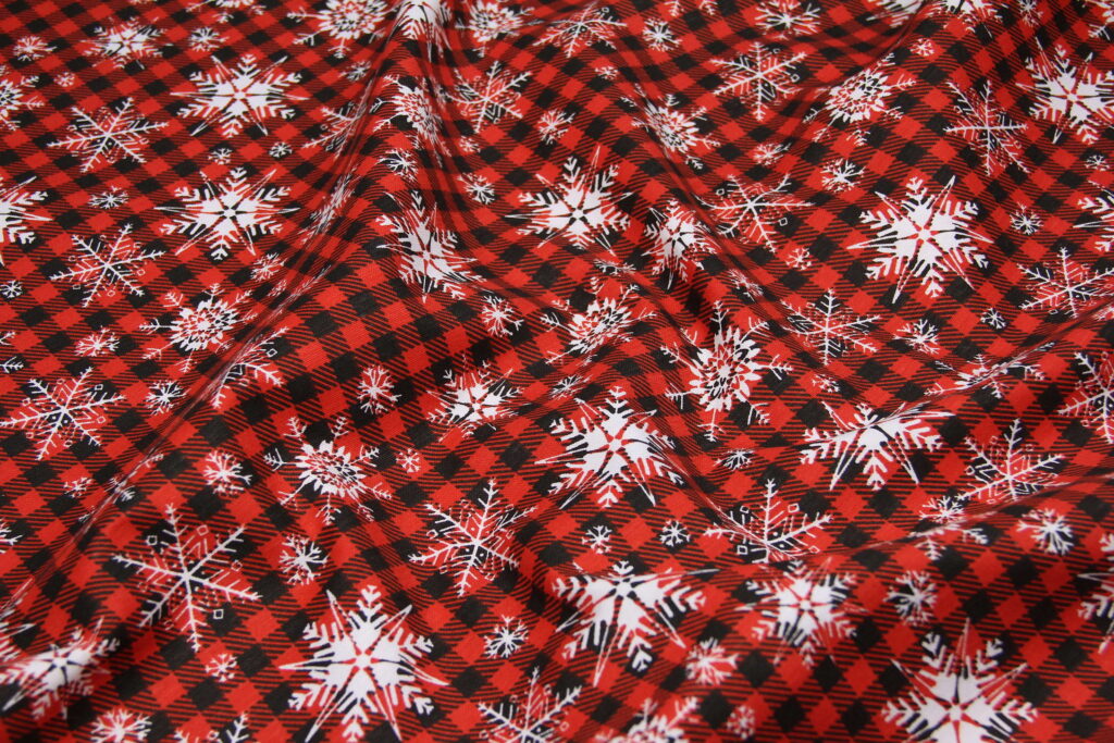 Ткань скатертная с тефлоновой пропиткой Снежинка на клеточке Красный и черный